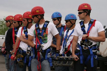 fire fighters in climbing gear