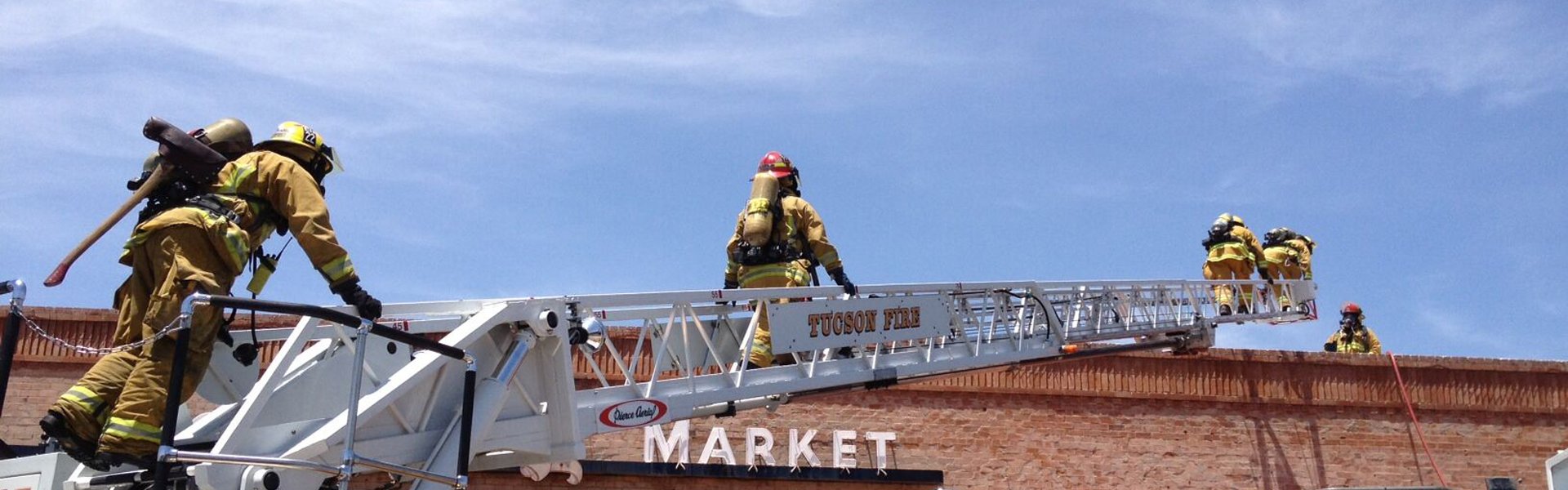 Firefighters on ladder