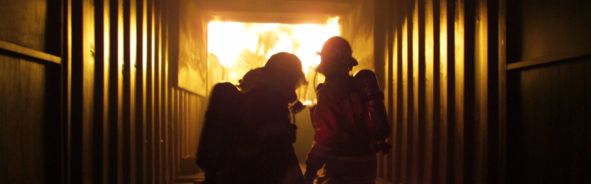 Firefighters looking into the fire